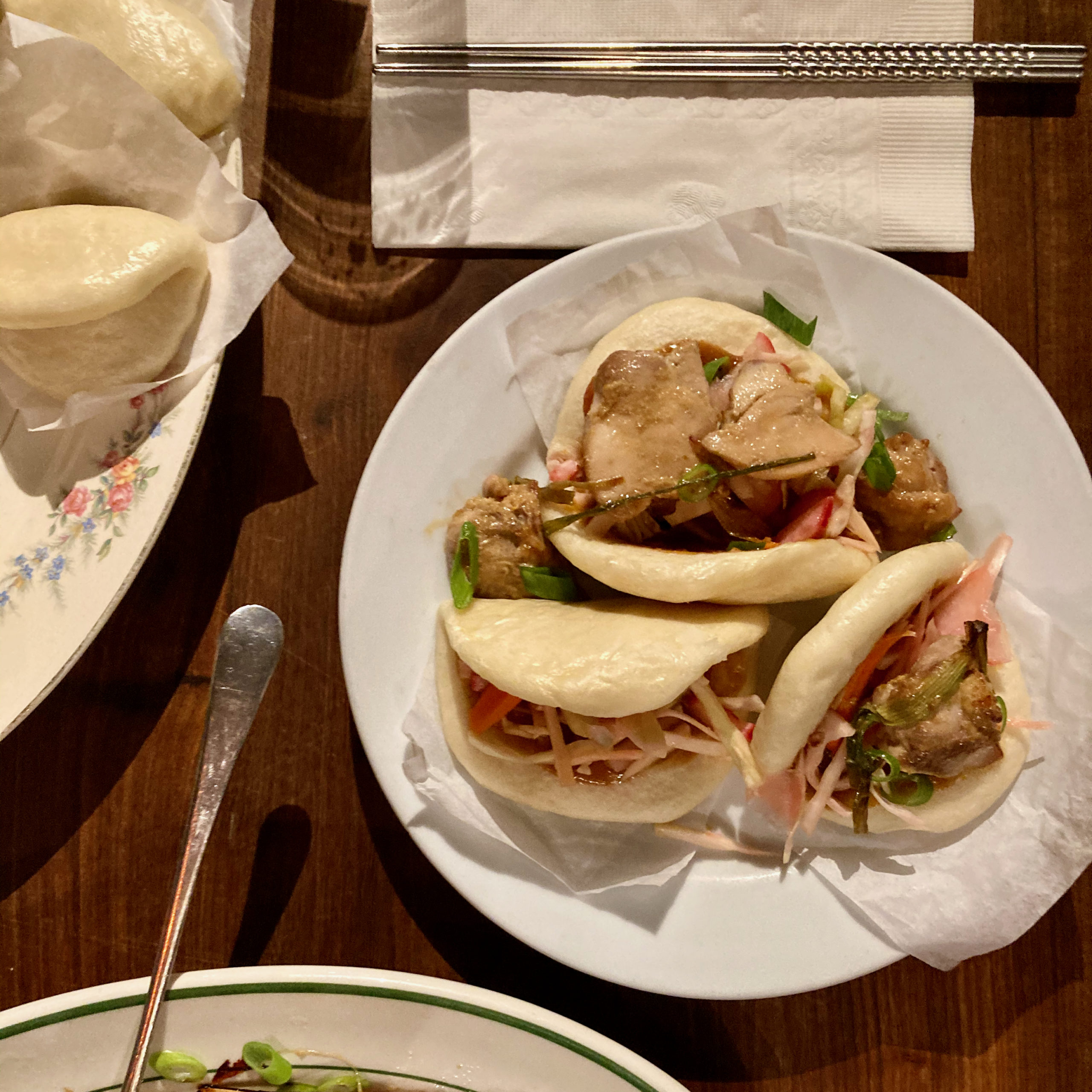 hand-sized sandwiches with steamed buns and variety of fillings